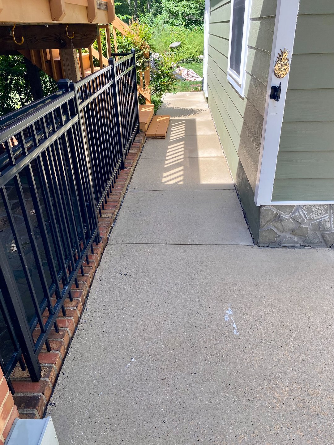 Concrete Sidewalk Cleaning Along Side of Home in Lorton, VA